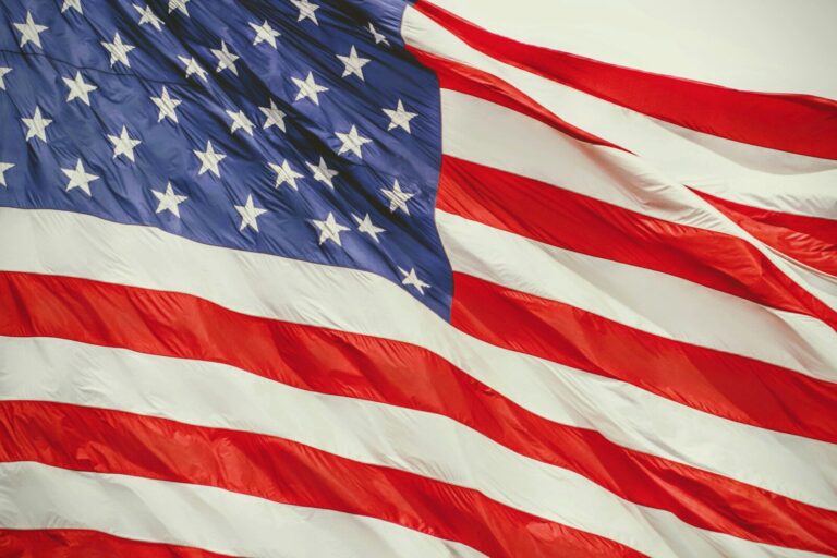 Trump Announces $2.4B in AI Compute Pledges From Nvidia, OpenAI and Other Tech Giants for Federal Genesis Mission USA flag